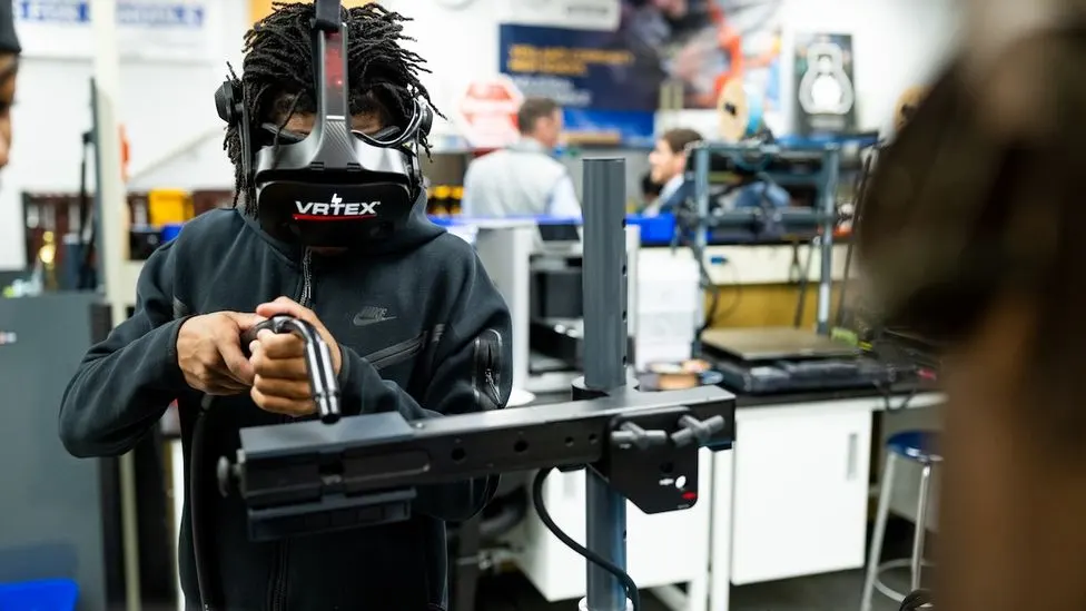 A teen student wearing a VR headset