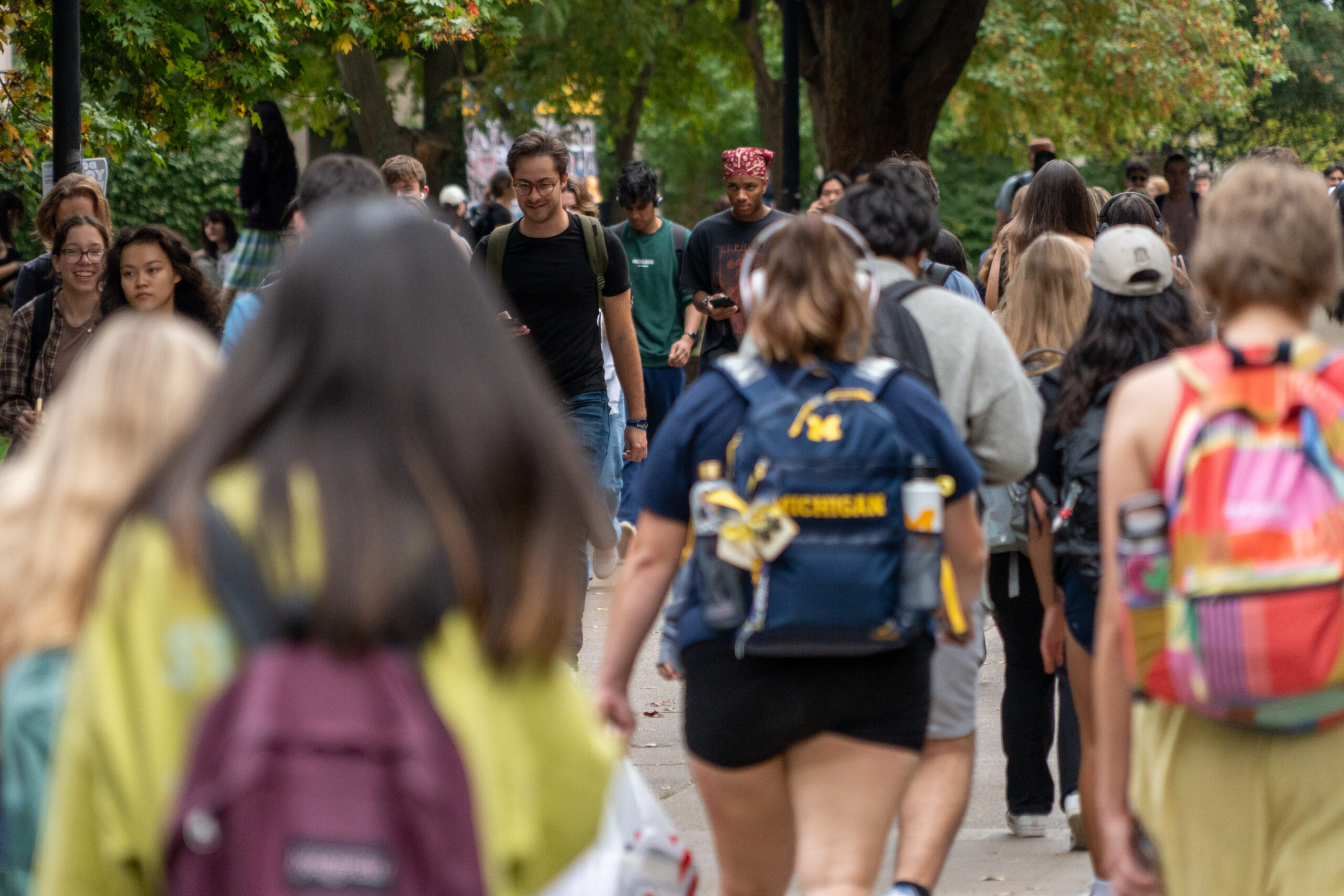 Students hanging out and studying at the Diag